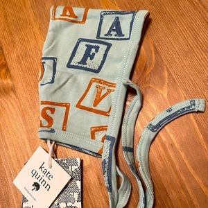 Blue baby block themed baby hat from Kate Quinn!